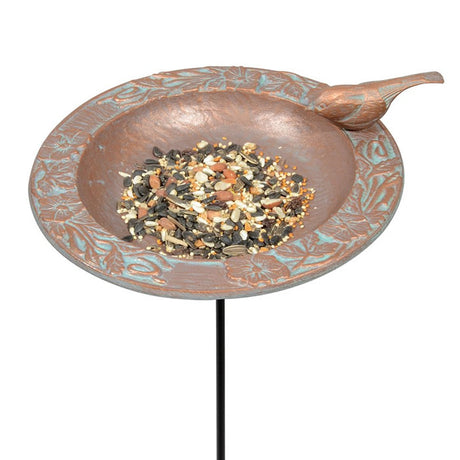 Chickadee Garden Bird Feeder featuring a charming chickadee, filled with seeds, and embossed leaf border for perching. Hand-cast metal with a rust-proof finish.
