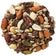 Round circle of wild bird seed that has fruit, nuts and seeds for wild birds.  White background. 