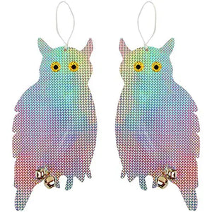 Owl Bird Repellent Reflective Holographic, 2 Pack: Two owl-shaped tags with bells, designed as bird deterrents with iridescent surfaces for gardens and patios.
