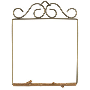 Decorative metal frame with intricate designs on a white background