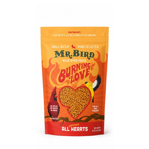 Mr. Bird Wild Bird Food 'Burning Love' all hearts snack mix in a bright orange and red stand-up pouch with a heart-shaped window showing the seed mix inside.